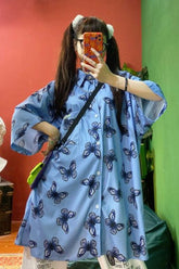 Camisa holgada de manga corta con estampado de mariposas